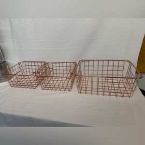 Rose gold metal wire baskets — super handy and look great anywhere.